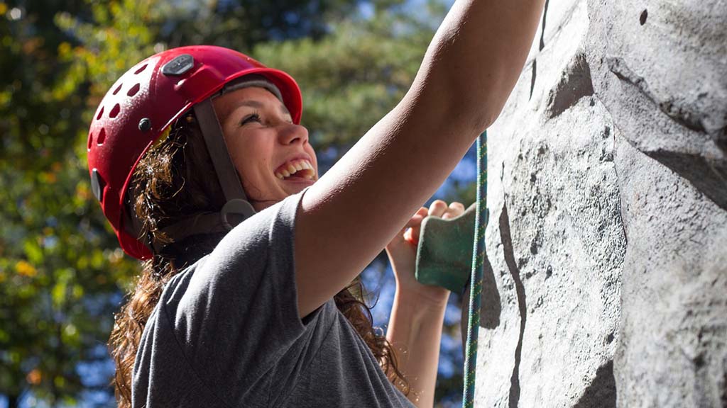 A climber rock climbing at Susunia